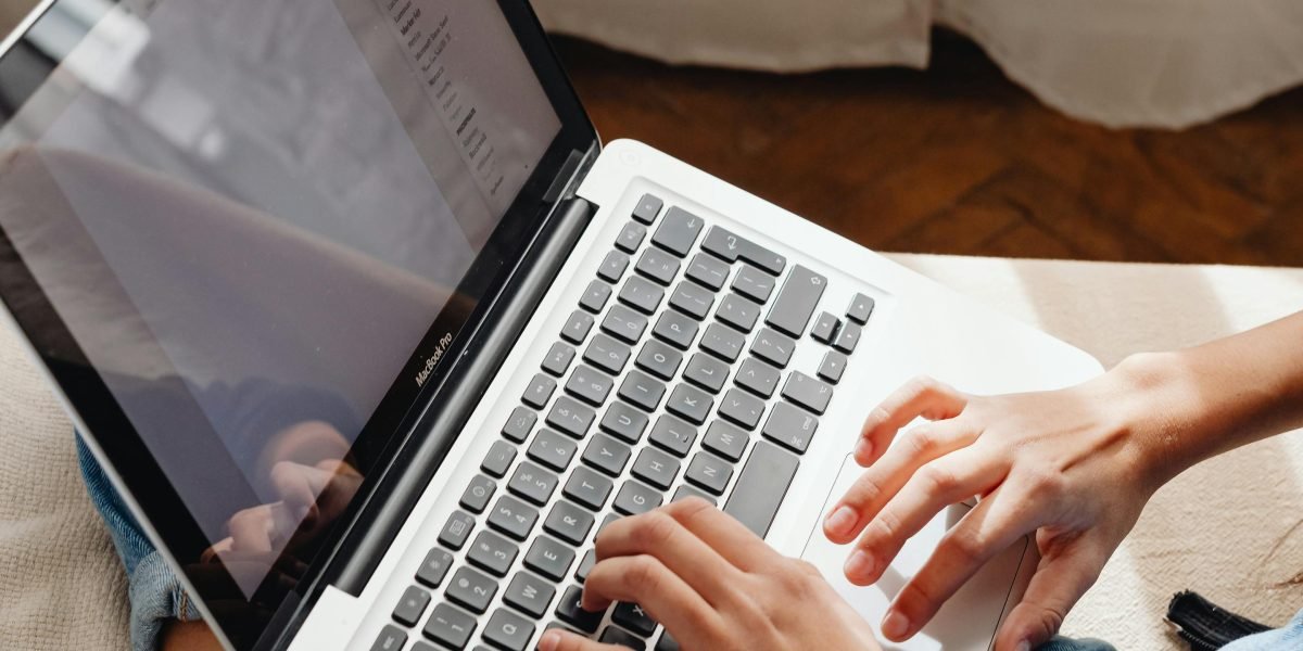 An individual thoughtfully researching various therapy options online, emphasizing the process of finding the right fit.