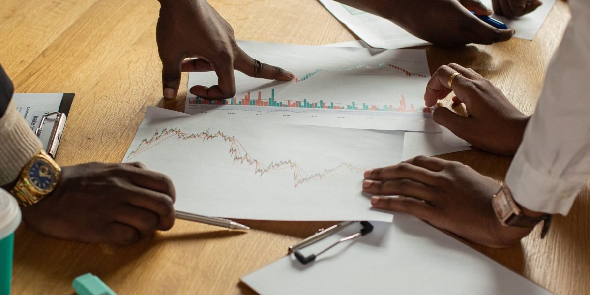Two researchers collaborating and discussing findings, emphasizing the analytical aspect of anxiety research.