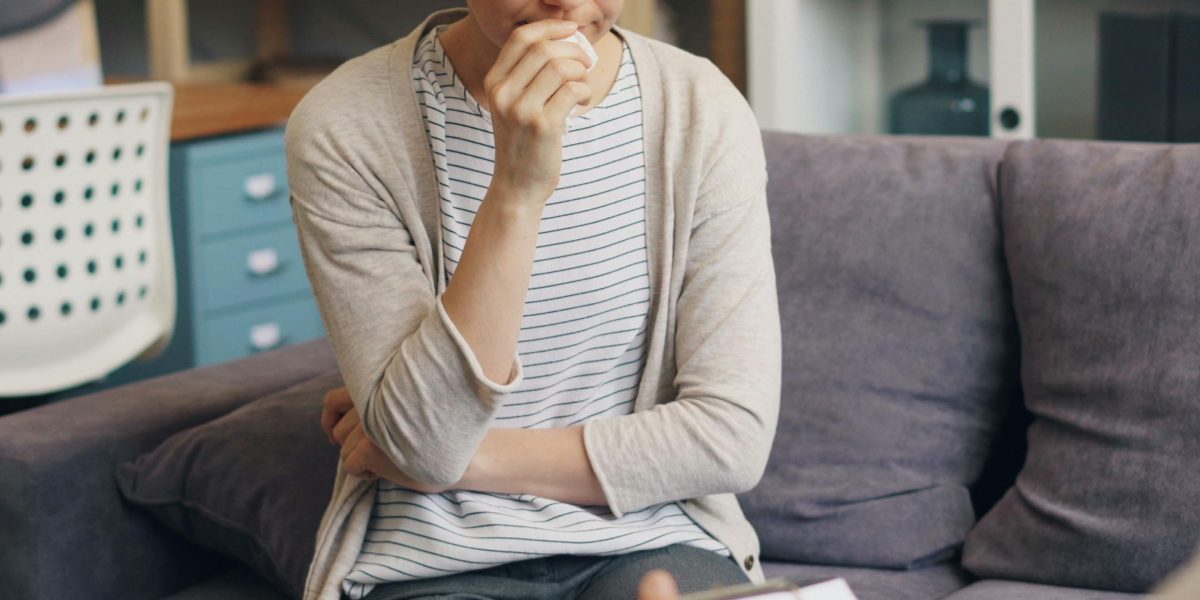 A person seeking guidance, embodying the act of interviewing a professional to find the right therapeutic match.