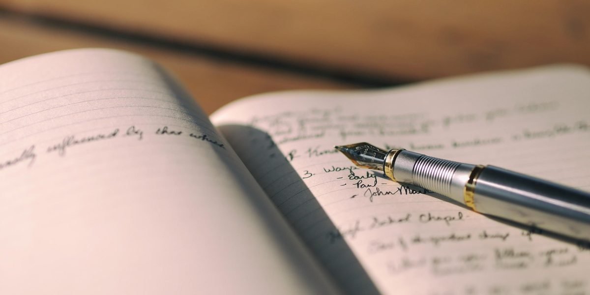 A person engaged in reflective writing, illustrating the practice of thought records or journaling.