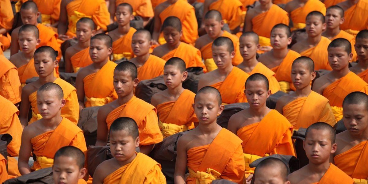 A person engaged in mindful meditation, representing the calming practices of MBCT.