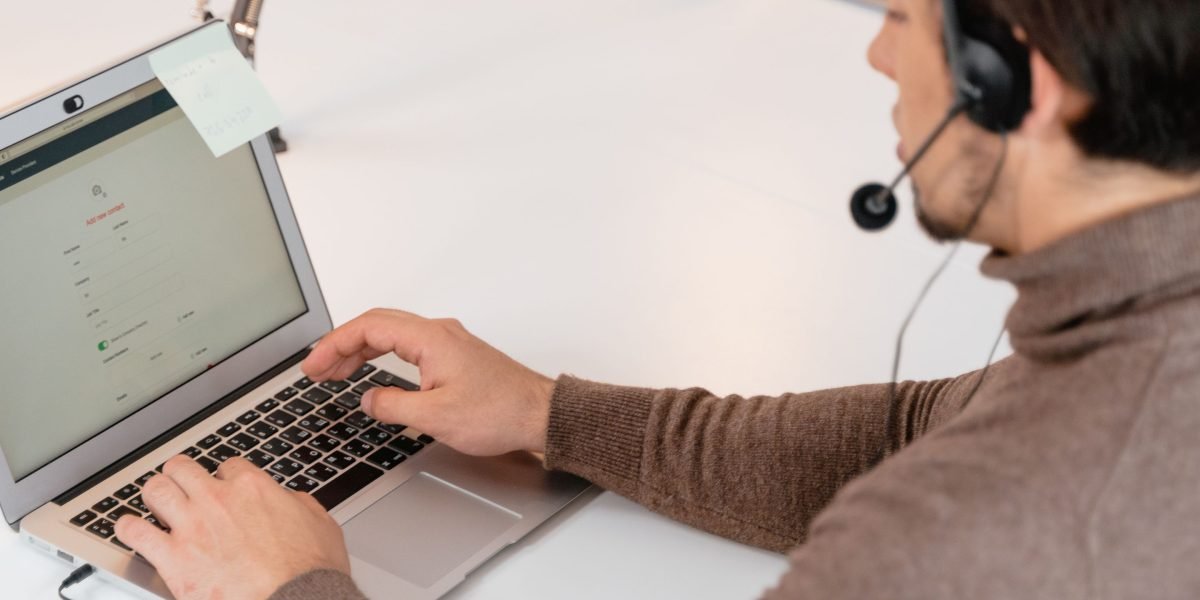 A person engaging with an online form, illustrating the process of creating an account for a new service.