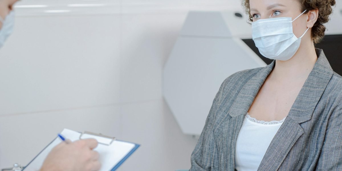 A person undergoing a routine medical check-up with a healthcare provider.