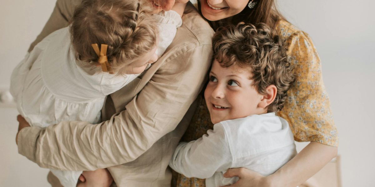 A family enjoying a calm and connected moment, symbolizing improved attachment and reduced anxiety.