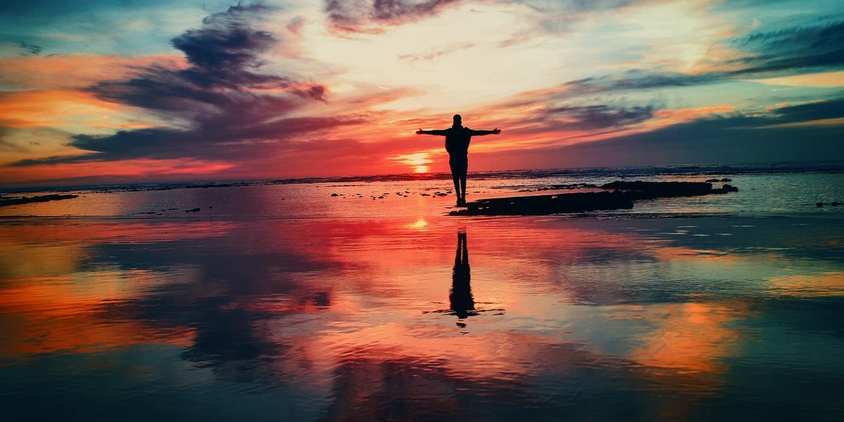 An individual feeling a sense of relief and accomplishment, symbolizing progress made in therapy.