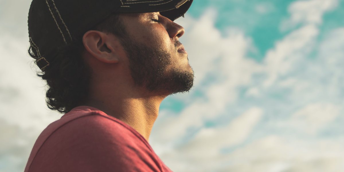 A person calmly practicing a deep breathing exercise to find immediate relief from anxiety.