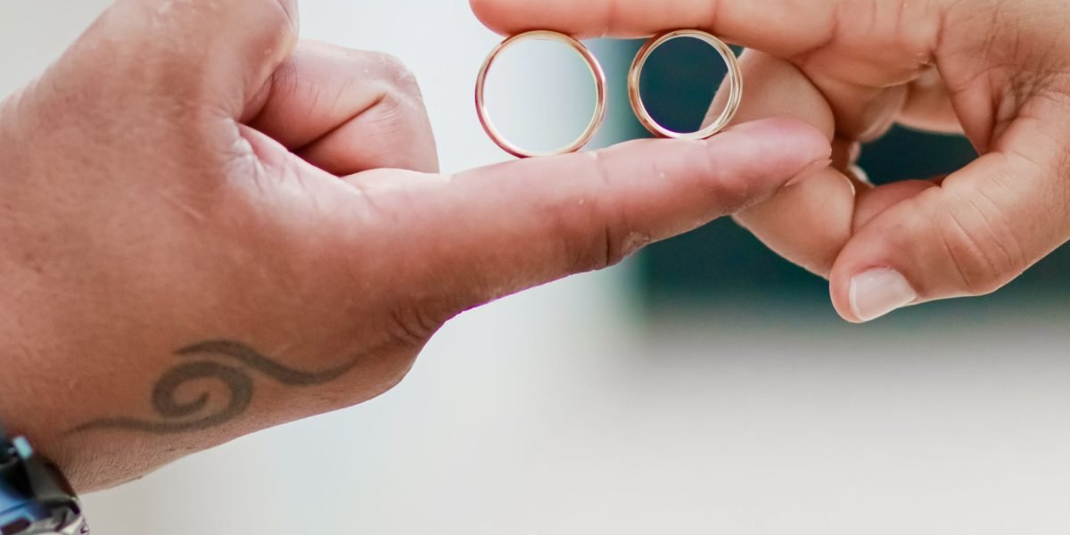 A symbolic image of two people's hands intertwined, representing the feeling of being 'tied too tightly' in a codependent relationship.