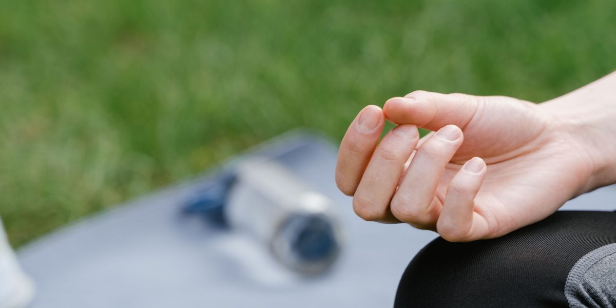 A person calmly practicing relaxation or mindfulness, symbolizing the application of CBT coping skills.