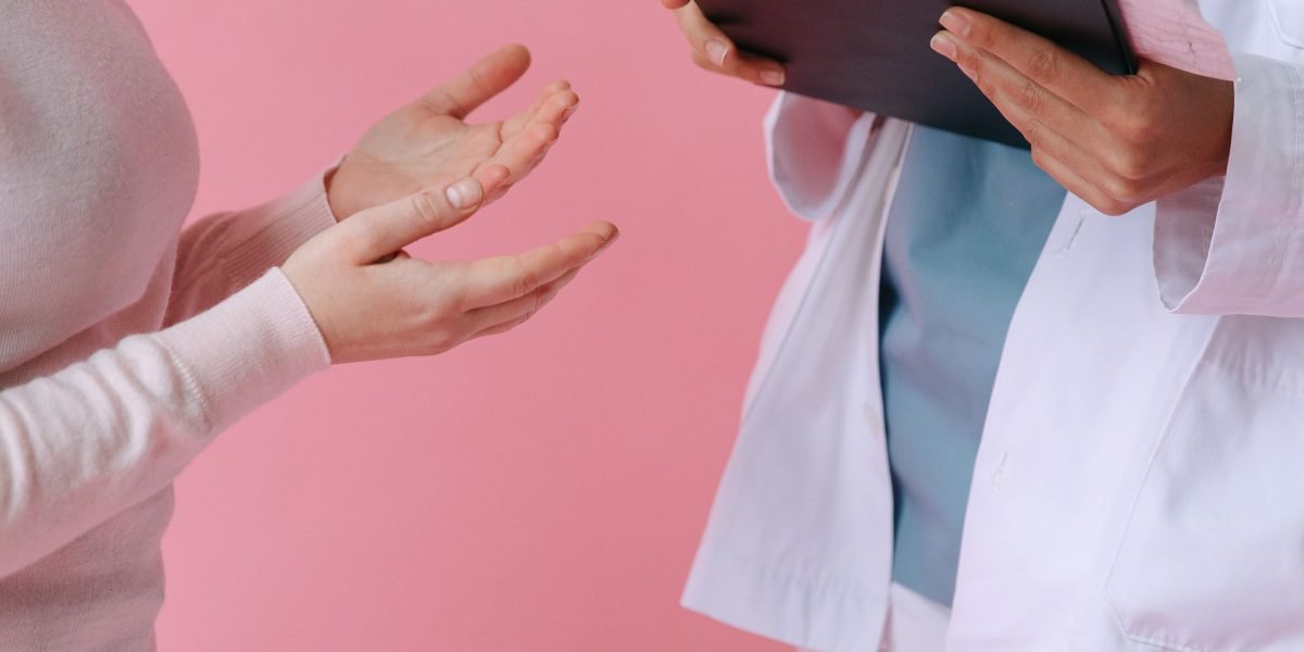 A patient engaging in a consultation with a doctor, discussing mental health concerns.