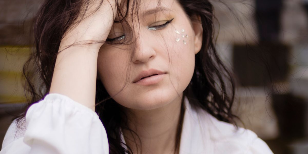 A person looking thoughtful and somewhat overwhelmed, symbolizing the intense struggle with anxiety.