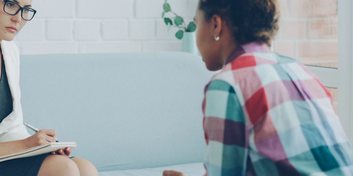 Illustrates the act of seeking professional help for mental health concerns, emphasizing proactive engagement.