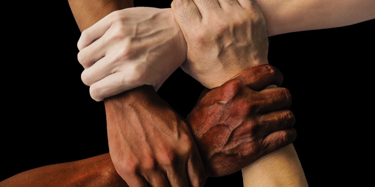 People connecting in a supportive group, sharing empathy and understanding.